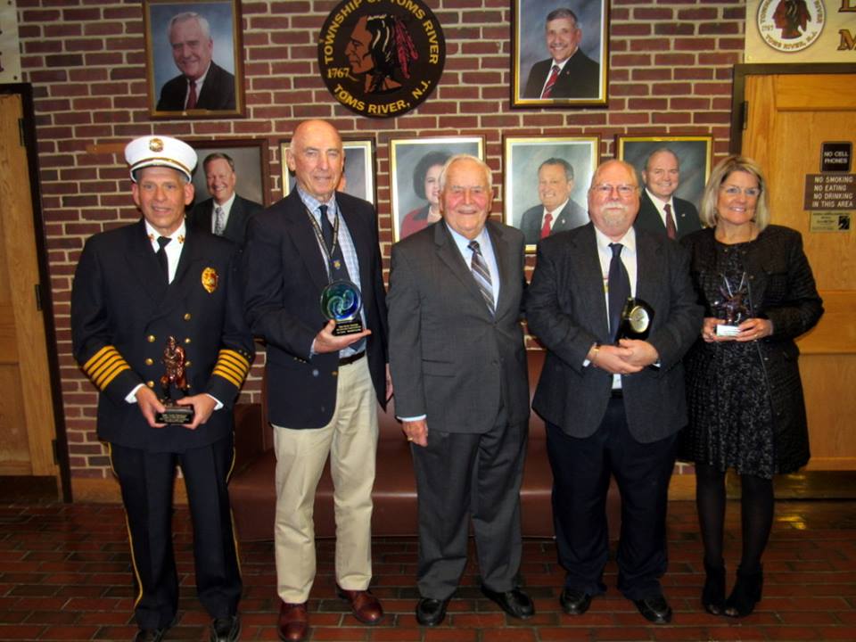Mayor Thomas Kelaher and a group of retiring township employees. (Photo: Toms River Township)