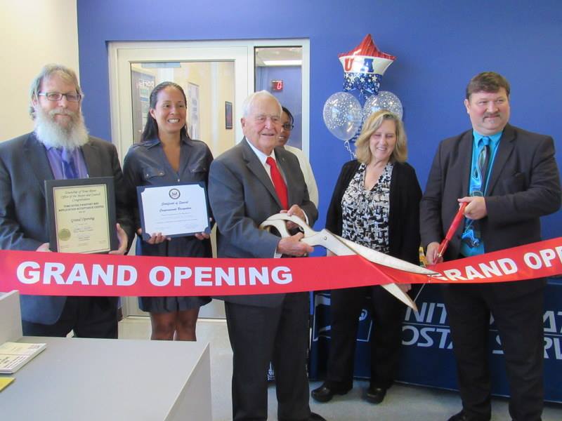 Mayor Thomas Kelaher cutting the ribbon at the TR Post Office's Passport Center, Sept. 2017. (Photo: Toms River Township)