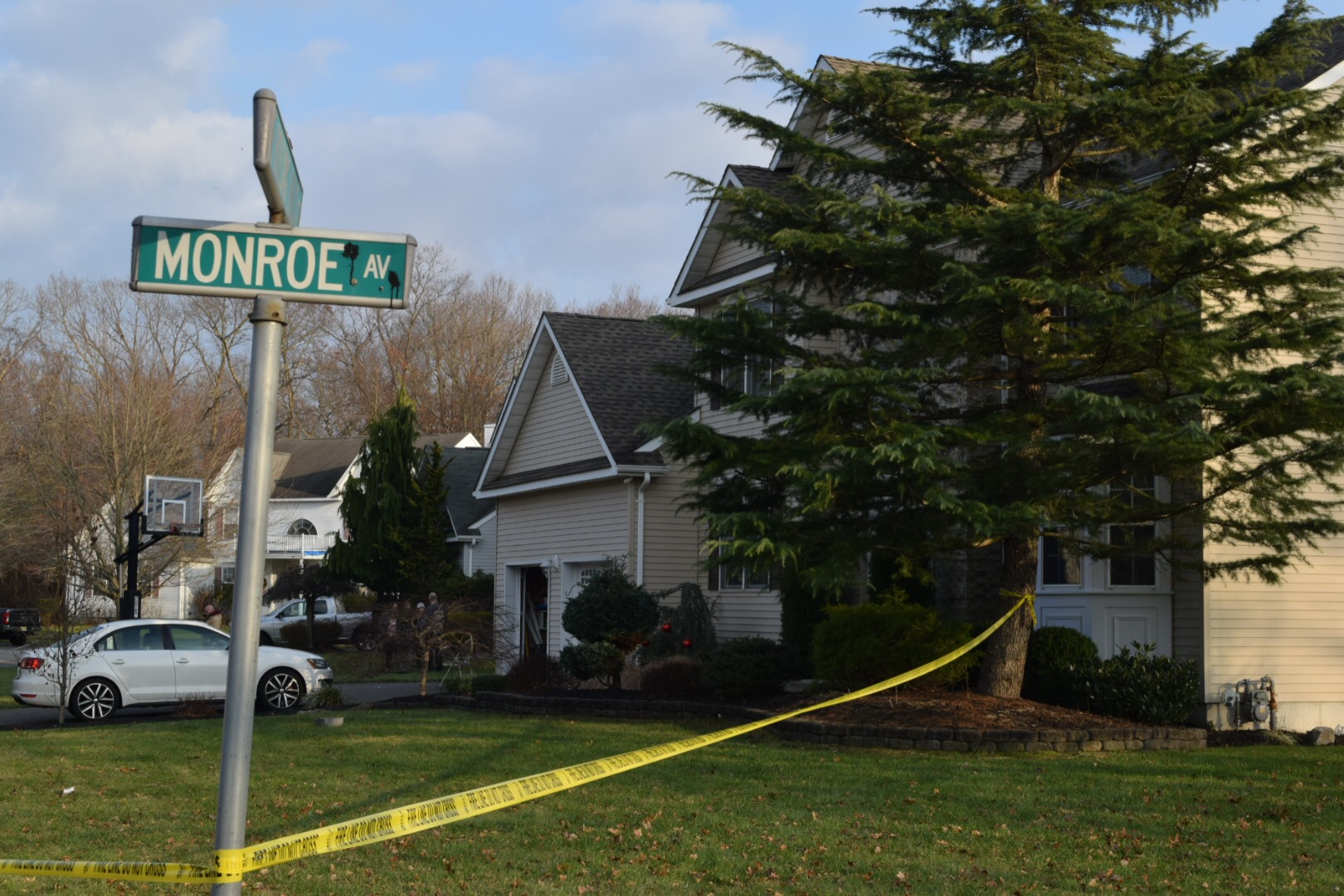 Police caution tape surrounding a home where a fire was reported, Dec. 13, 2018. (Photo: Daniel Nee)