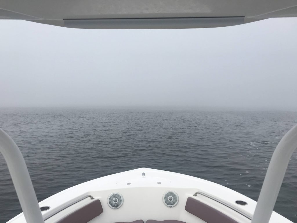 A boat navigates Barnegat Bay in dense fog. (Photo: Daniel Nee)