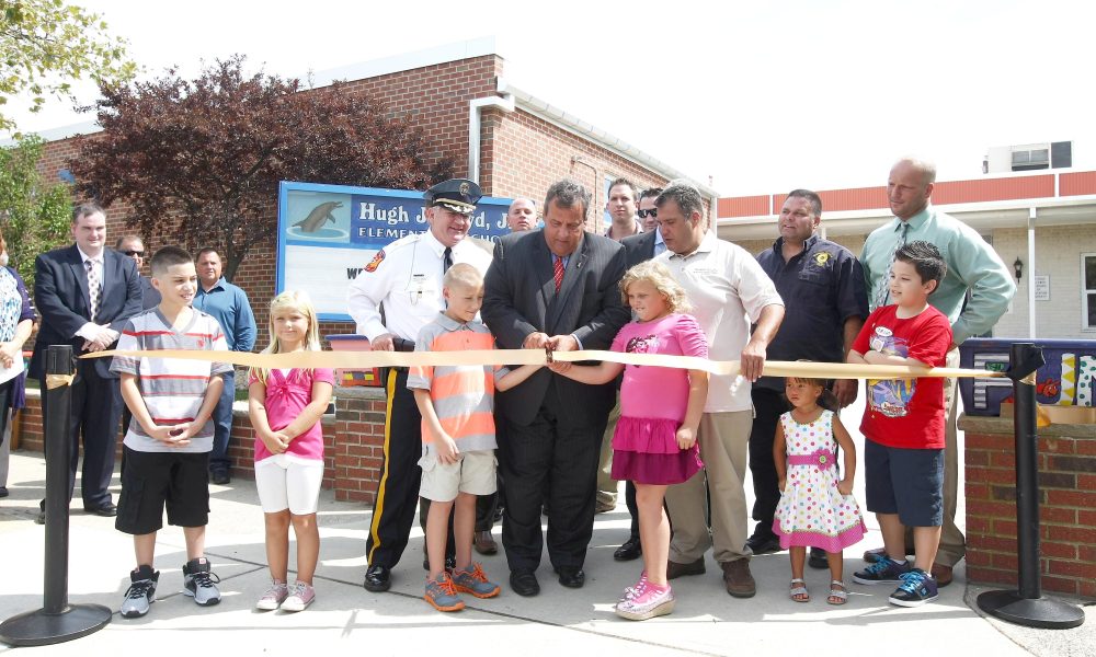 Former Gov. Chris Christie cuts the ribbon reopening the Hugh J. Boyd Elementary School following Superstorm Sandy, Sept. 5, 2013. (Photo: Governor's Office/ Tim Larsen)