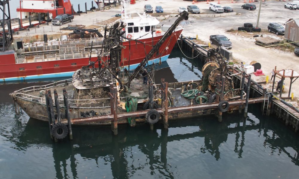 The Susan Rose, submerged under the Atlantic Ocean for a year, is tied up along Channel Drive in Point Pleasant Beach after being re-floated, Nov. 20, 2024. (Photo: John Barrett)